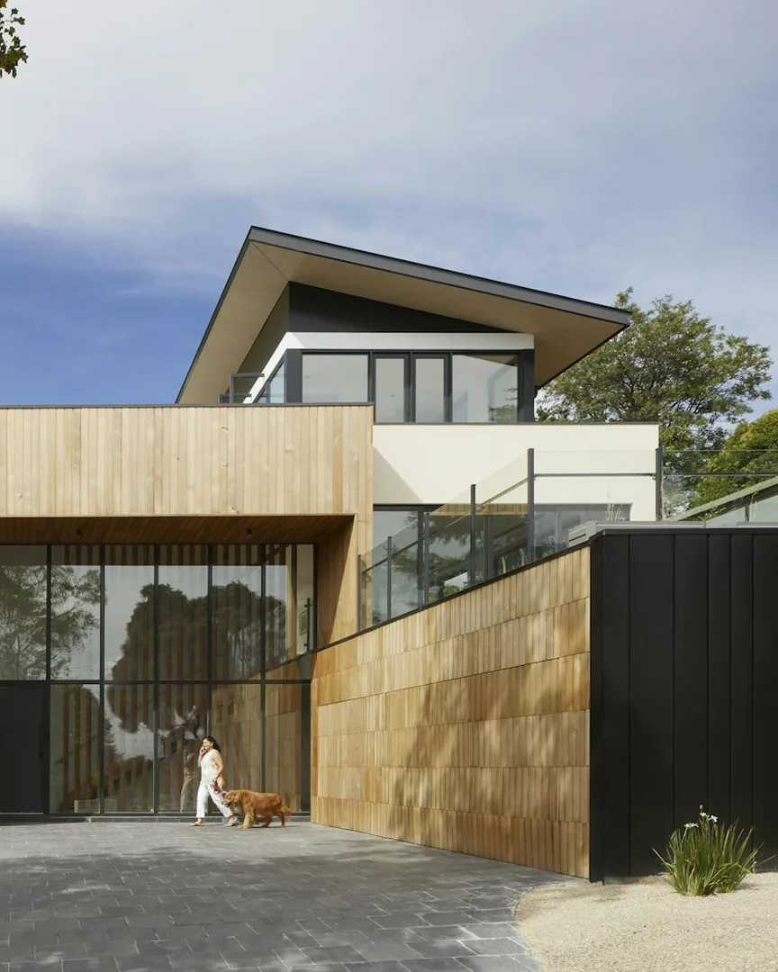 Minimal entryway with warm neutral surfaces and natural light