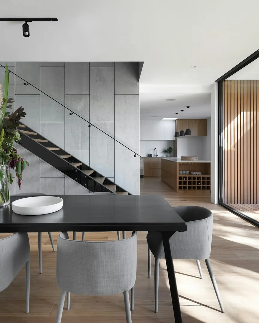 Light-filled modern interior with tropical plants and natural materials